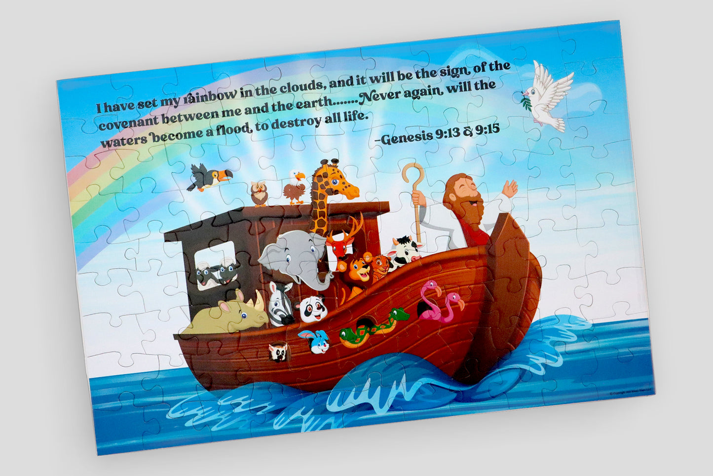 99 Piece Noah's Ark Puzzle built and complete. Puzzle image depicts bible scripture along with a rainbow and animals as well Noah on the Ark. I Sow Brilliant